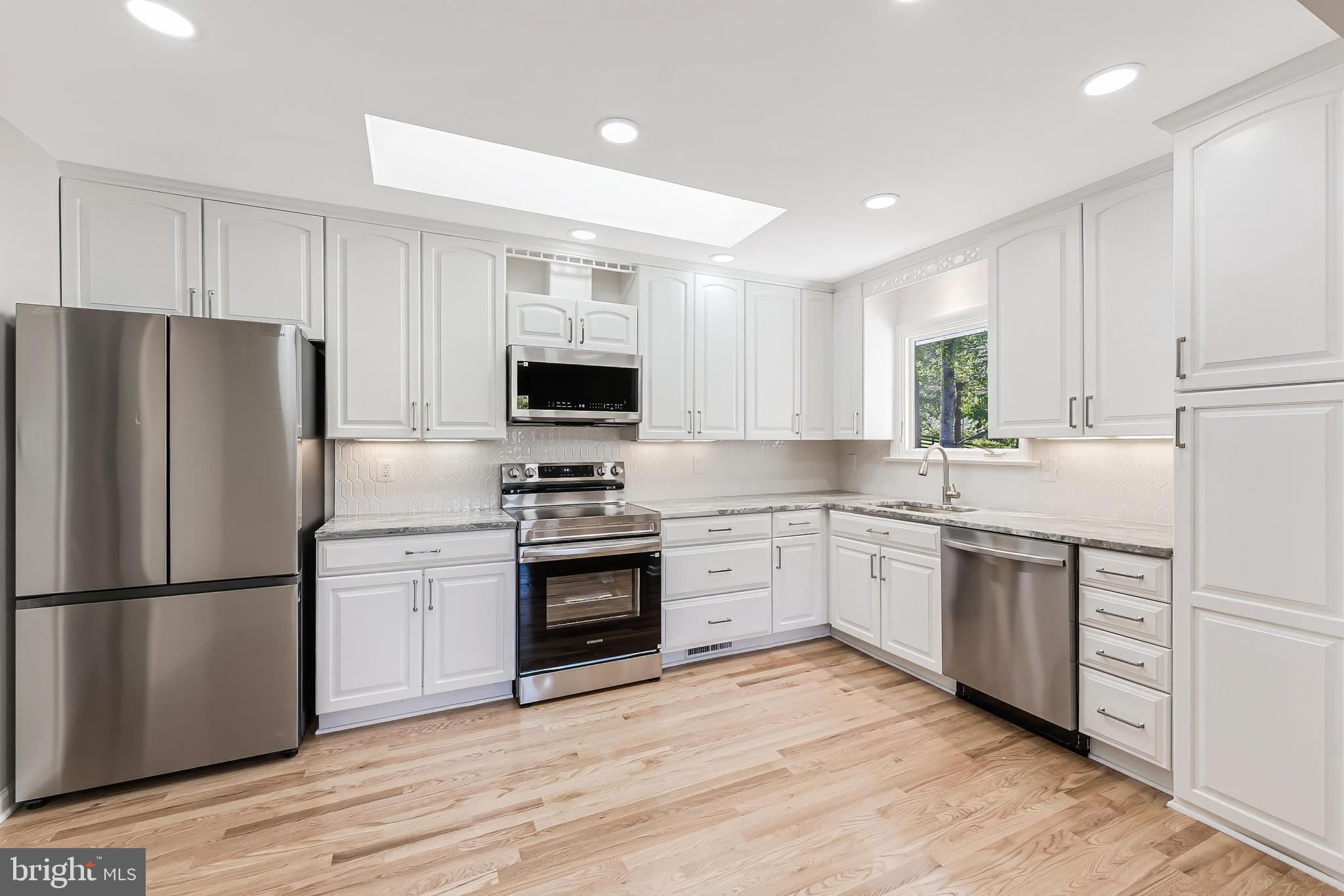 6891 Wilson Road Marshall, VA 20115 - Photo 60 of 118 Modern kitchen with sleek finishes.