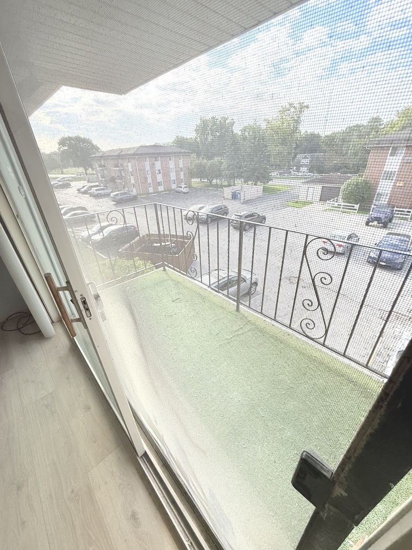 1925 Canal Street, Unit 3D Blue Island, IL 60406 - Photo 10 of 21 a view of balcony with furniture