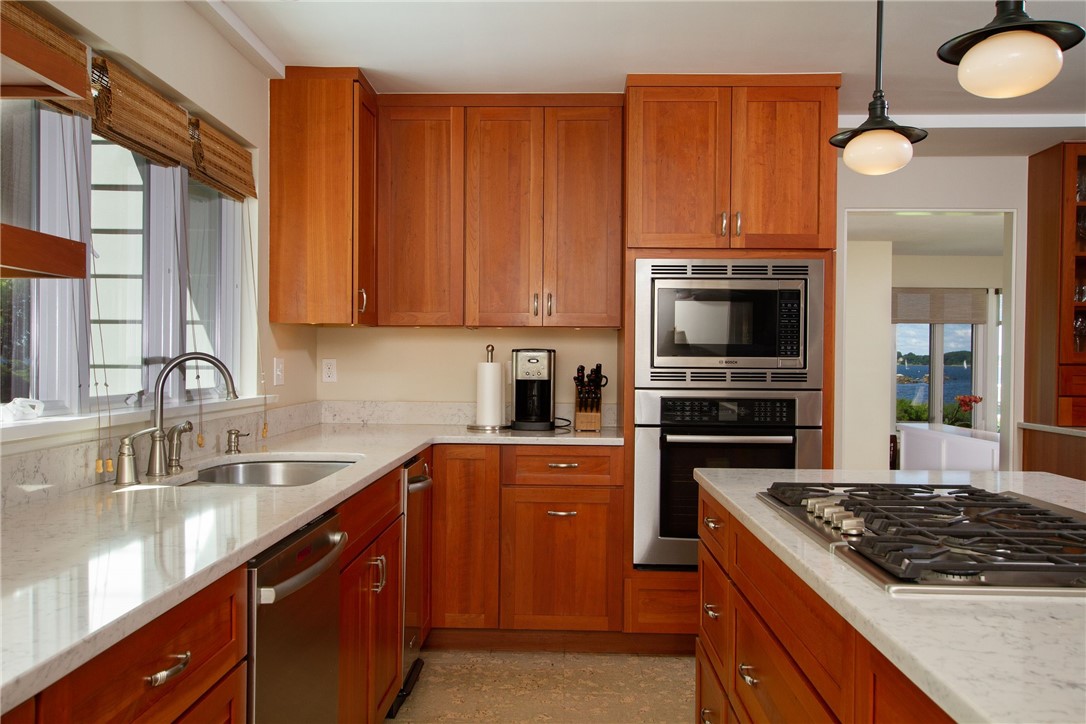 151 Ferry Road Bristol, RI 02809 - Photo 15 of 49 New cherry kitchen with stainless appliances and quartz countertop