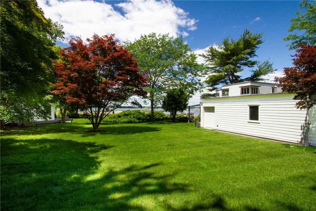 151 Ferry Road Bristol, RI 02809 - Photo 45 of 49 South facing end of new garage offers 3rd bay for lawn equipment