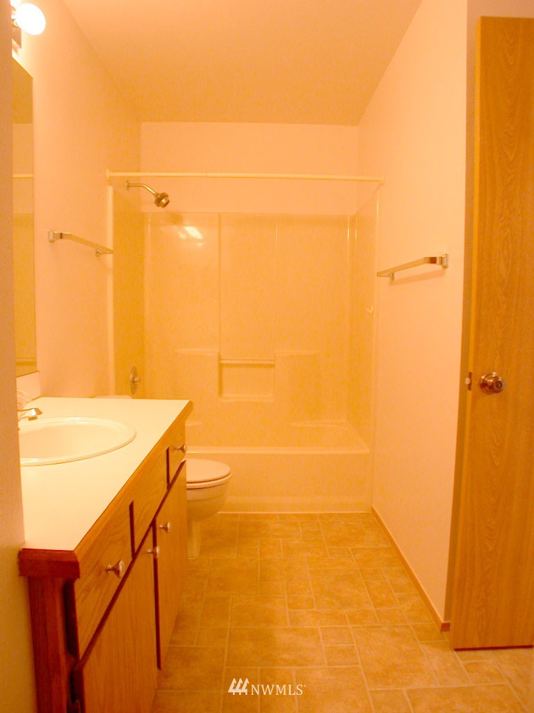 2900 Northeast 8th Street Renton, WA 98056 - Photo 10 of 25 a bathroom with a shower and a sink