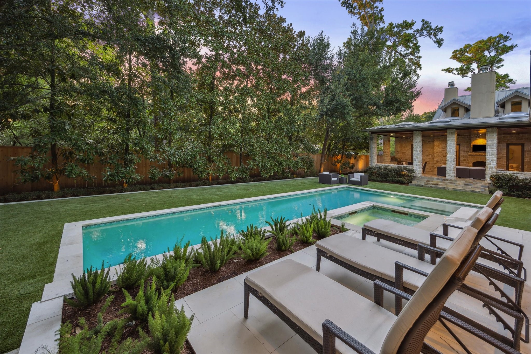 354 Piney Point Road Houston, TX 77024 - Photo 19 of 49 a view of a chair and table on the garden