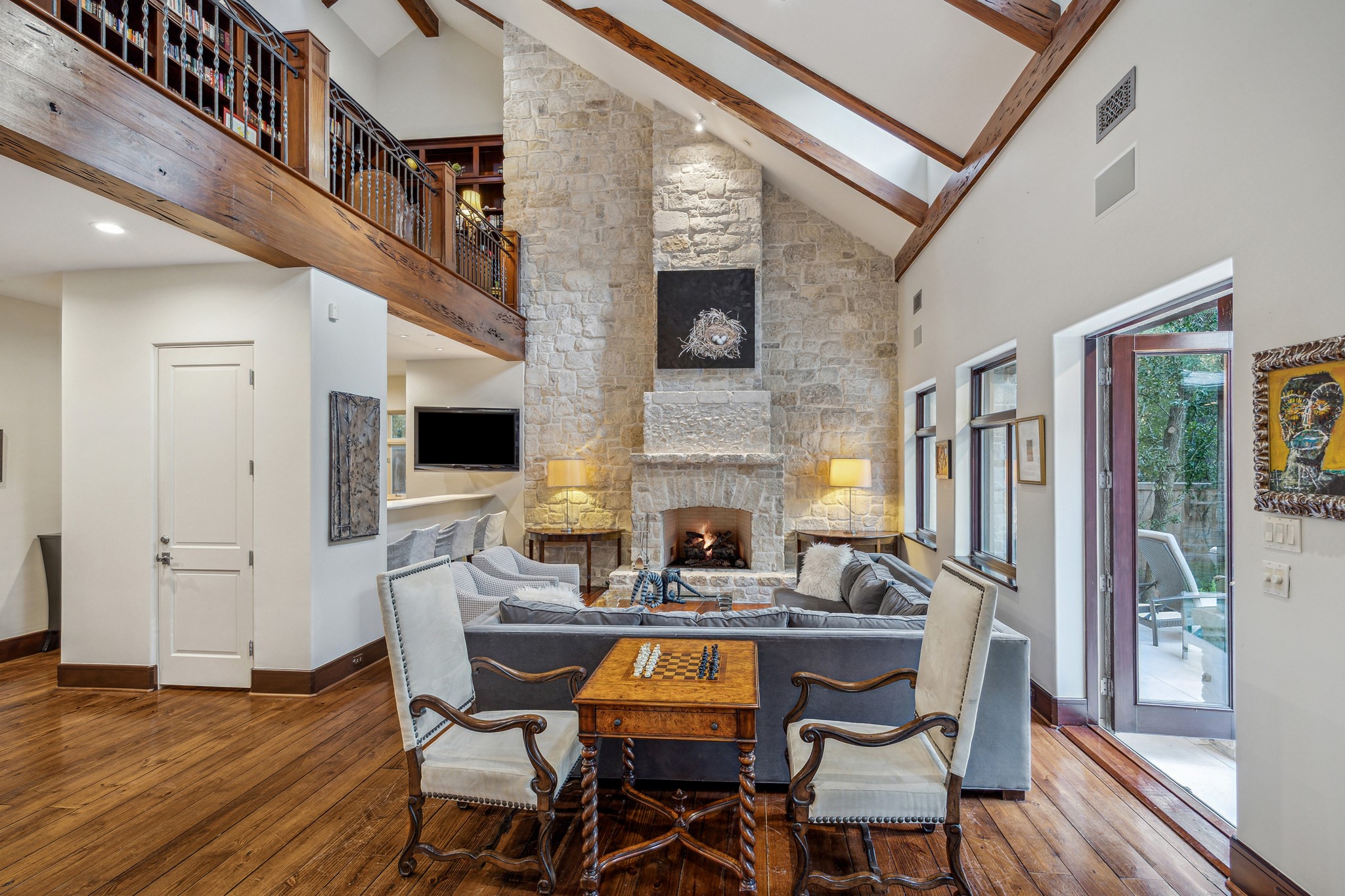 354 Piney Point Road Houston, TX 77024 - Photo 23 of 49 a view of a dining room with furniture and wooden floor