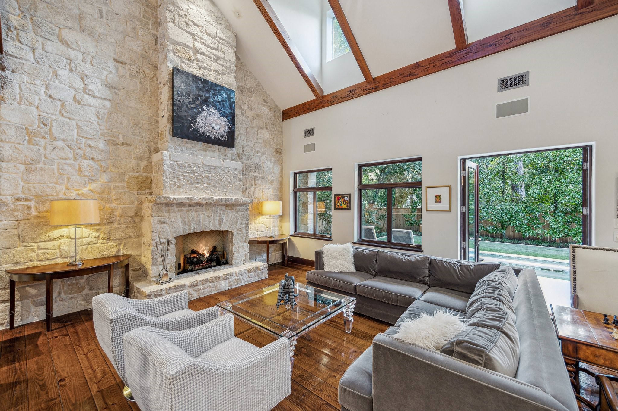 354 Piney Point Road Houston, TX 77024 - Photo 24 of 49 a living room with furniture and a fireplace