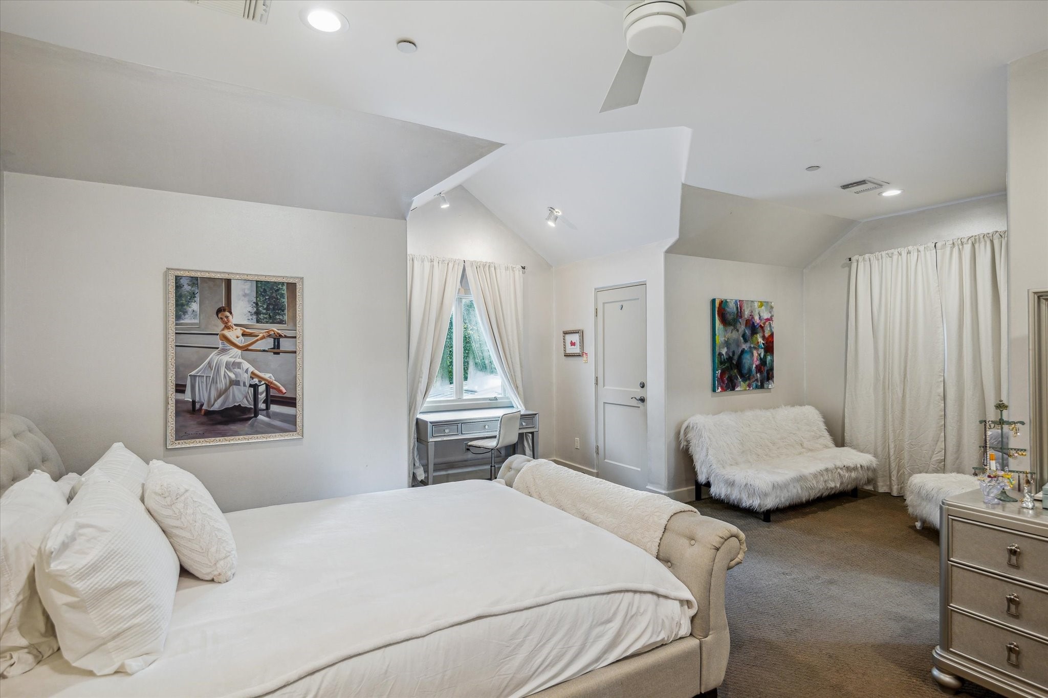 354 Piney Point Road Houston, TX 77024 - Photo 34 of 49 a bedroom with a bed and a couch