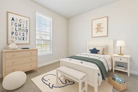 a bedroom with a bed and a chair