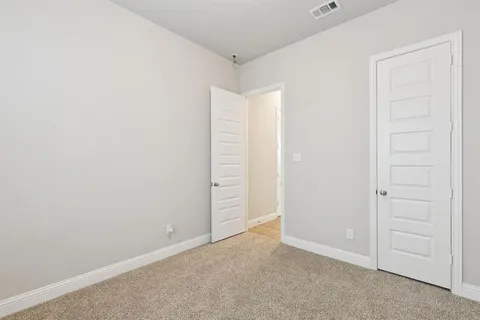 an empty room with closet