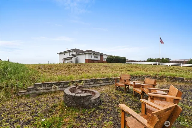 a view of a swimming pool with an ocean view