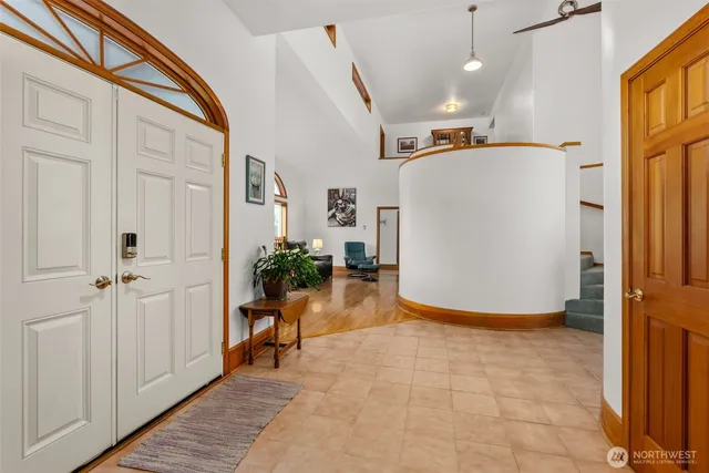 a view of a livingroom with furniture and front door