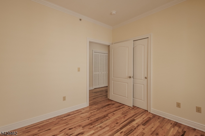 29 Freeman Street, Unit D2 Newark, NJ 07105 - Photo 11 of 29 a view of an empty room with wooden floor