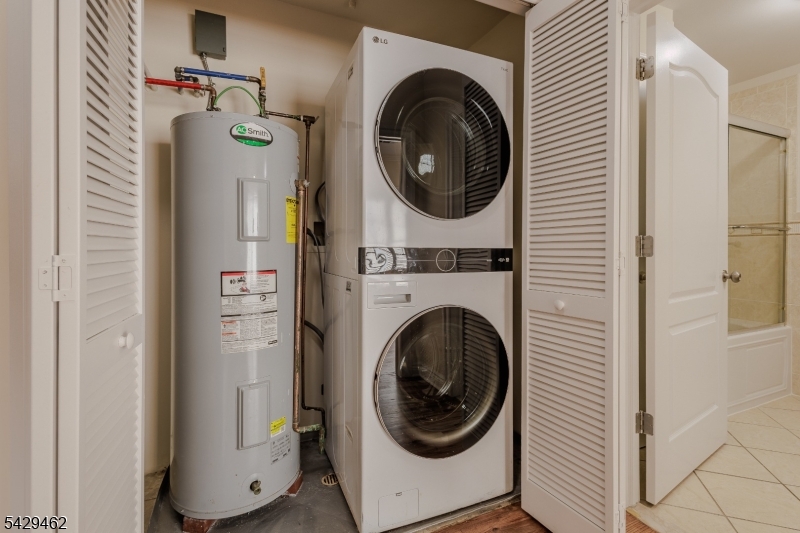 29 Freeman Street, Unit D2 Newark, NJ 07105 - Photo 25 of 29 a view of a hallway with washer and dryer