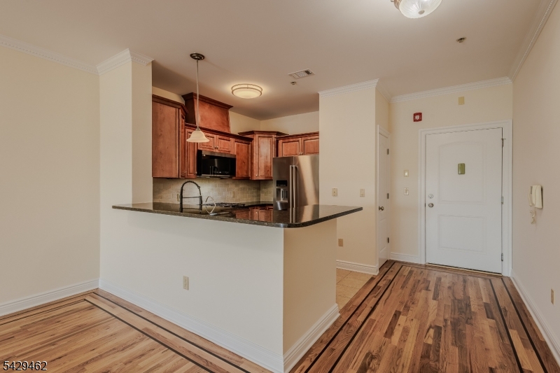 29 Freeman Street, Unit D2 Newark, NJ 07105 - Photo 4 of 29 a view of a kitchen from the hallway