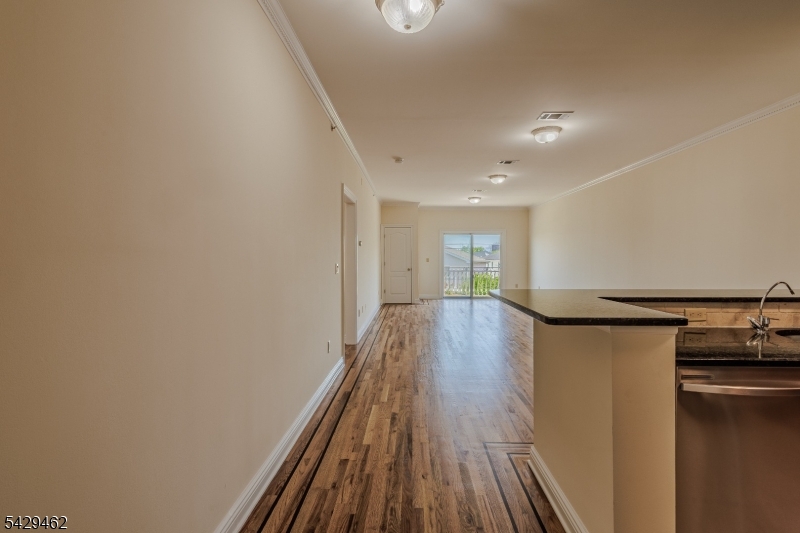 29 Freeman Street, Unit D2 Newark, NJ 07105 - Photo 5 of 29 a view of entryway with wooden floor