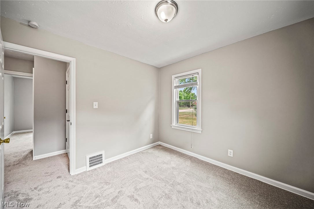649 Bishop Road Cleveland, OH 44143 - Photo 11 of 23 2nd first floor bedroom with new carpet & fresh paint