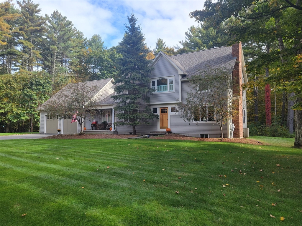 263 Sylvester Road Northampton, MA 01062 - Photo 1 of 35 a front view of a house with a garden