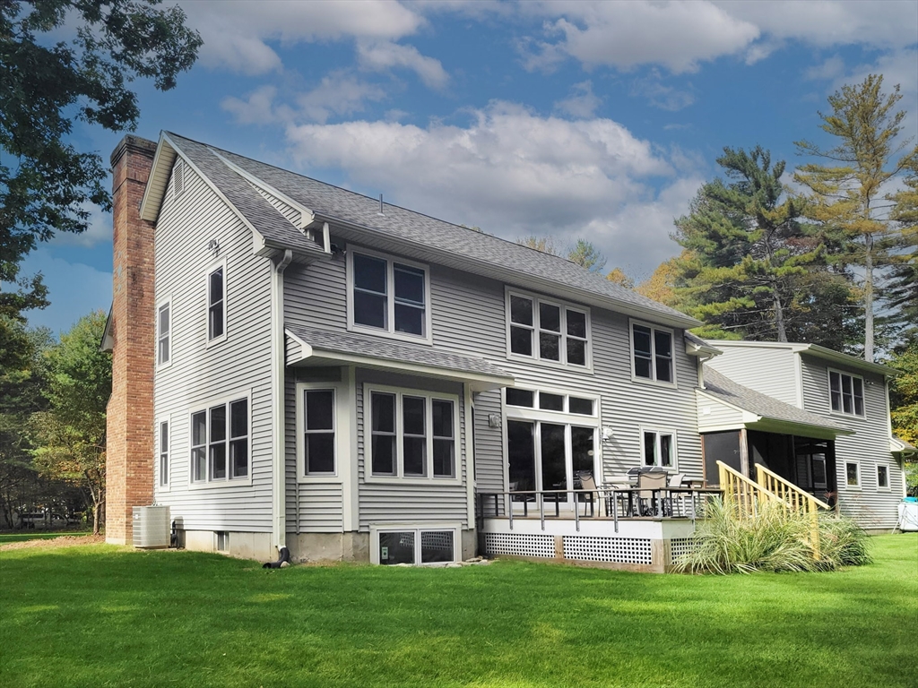 263 Sylvester Road Northampton, MA 01062 - Photo 3 of 35 a front view of a house with a yard