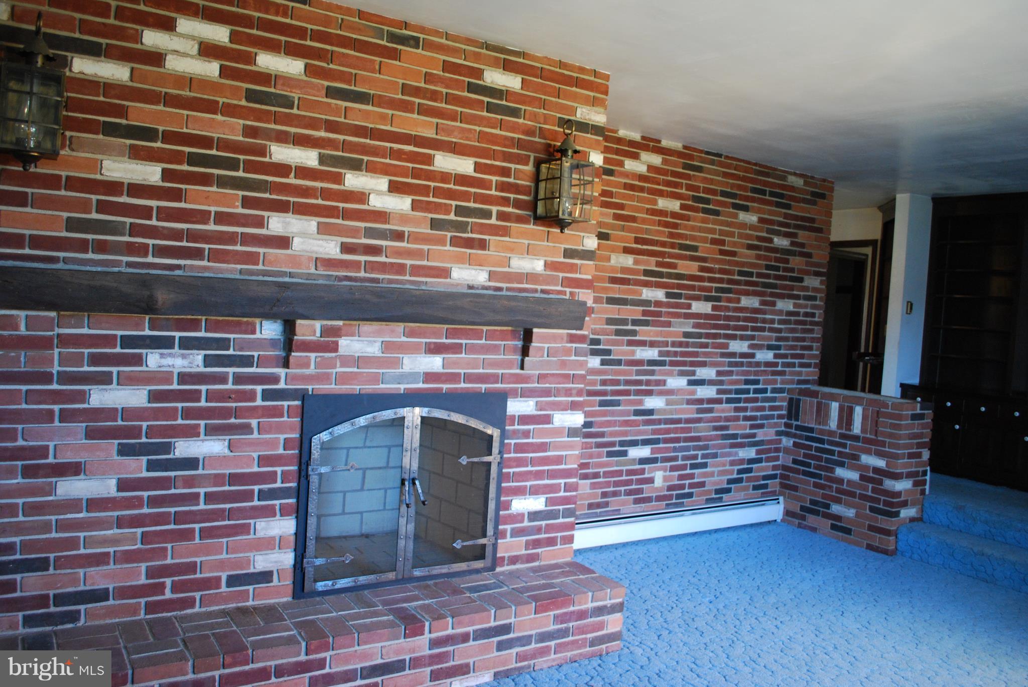 2860 Fridinger Mill Road Manchester, MD 21102 - Photo 12 of 30 Full brick wall in the living room