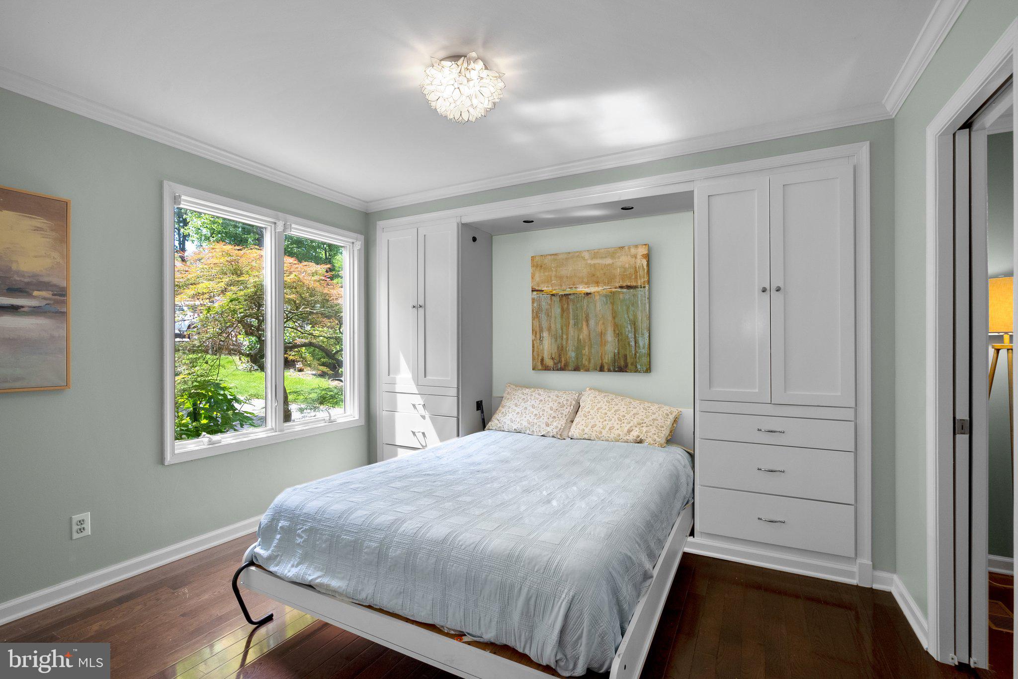 743 Rolling View Drive Annapolis, MD 21409 - Photo 26 of 100 a bedroom with a bed and a window