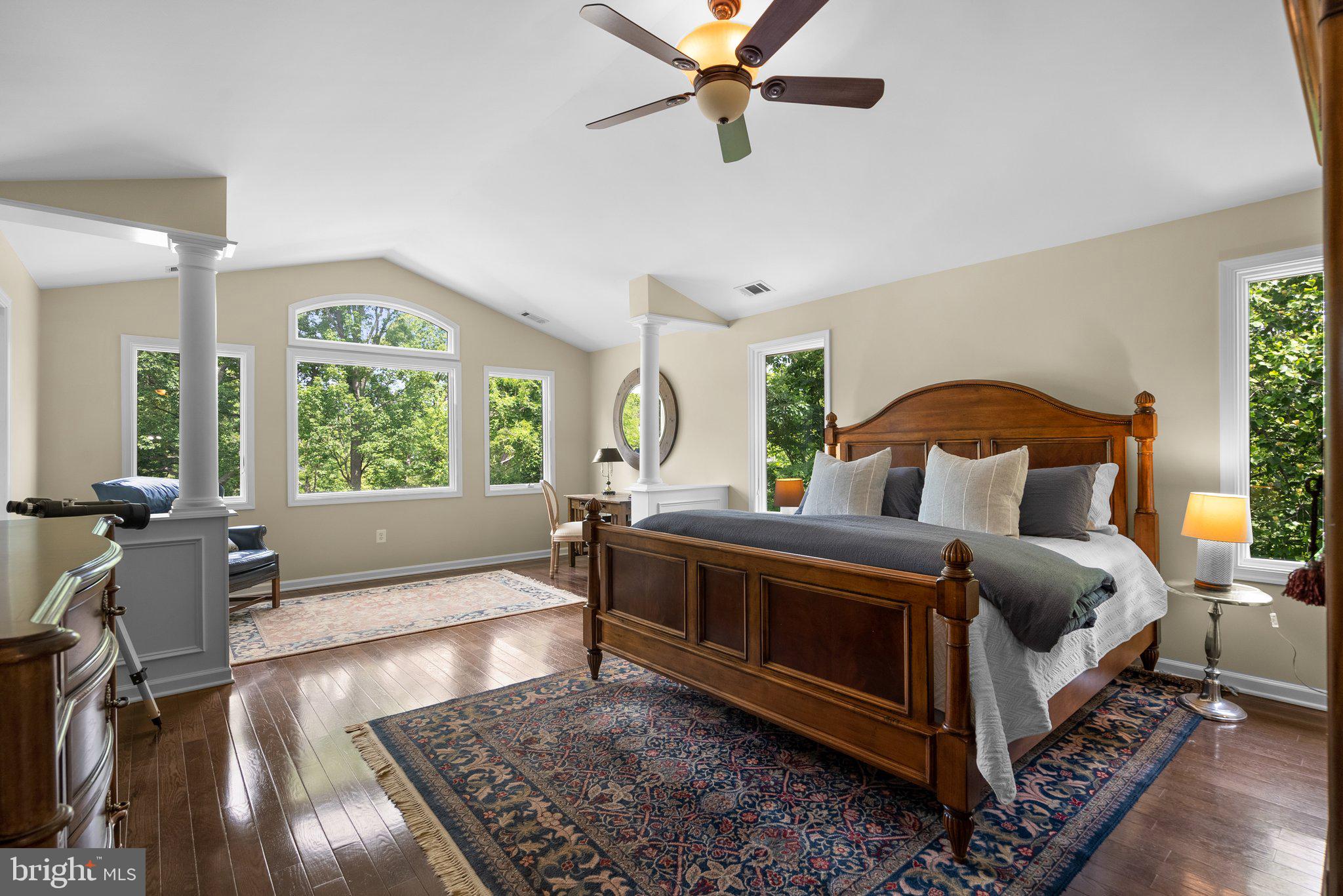 743 Rolling View Drive Annapolis, MD 21409 - Photo 34 of 100 a bedroom with a bed and wooden floor