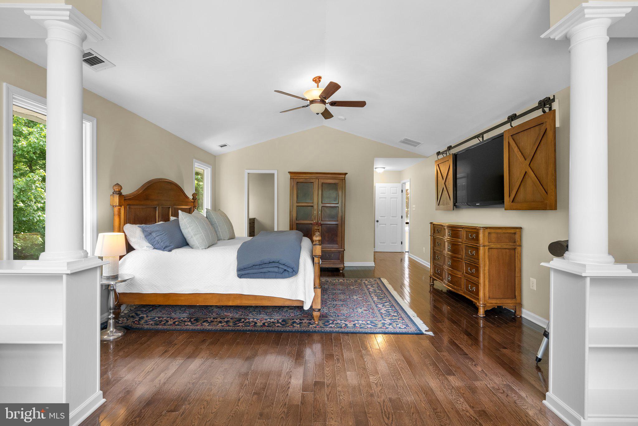 743 Rolling View Drive Annapolis, MD 21409 - Photo 43 of 100 a living room with fireplace furniture flat screen tv and wooden floor