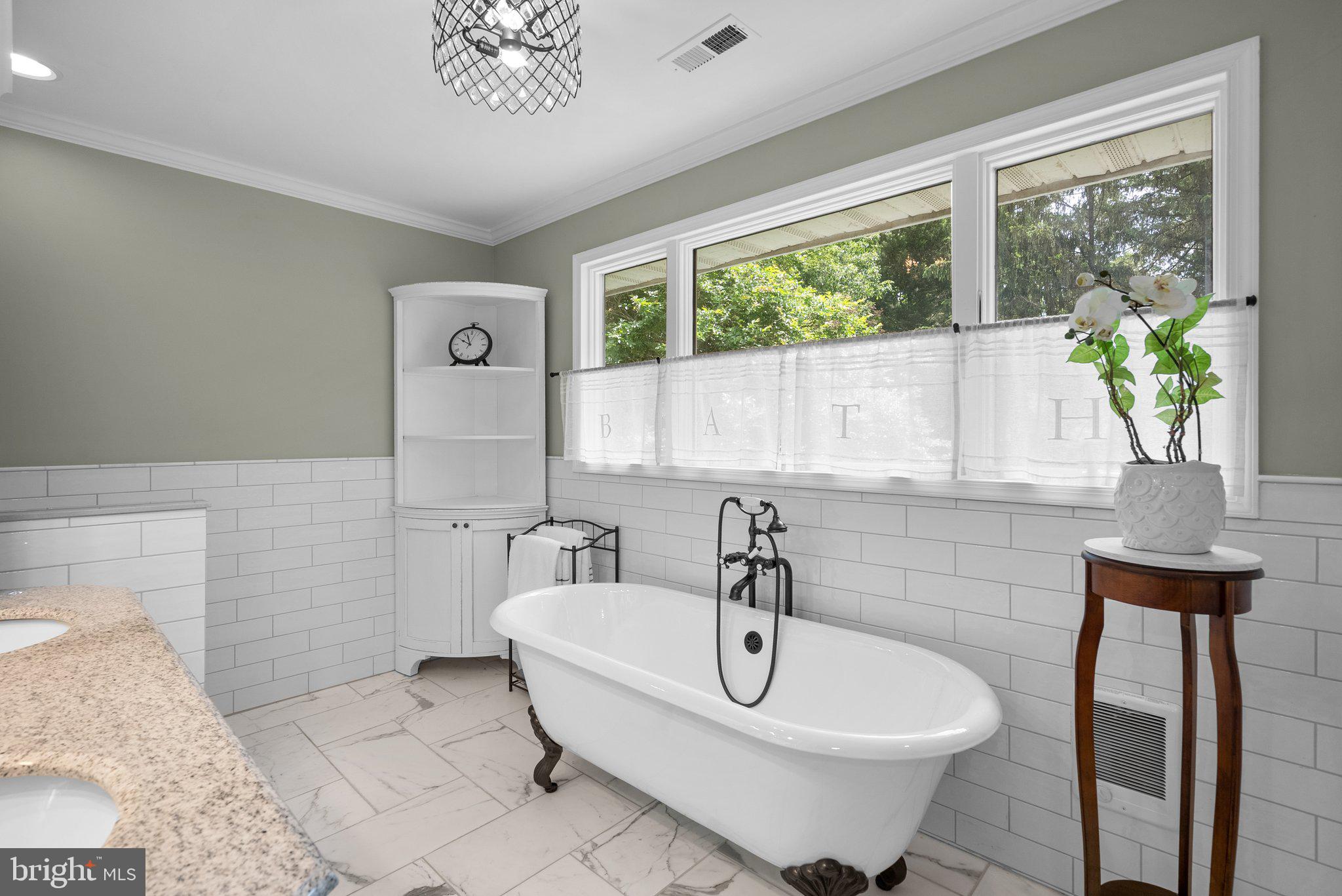 743 Rolling View Drive Annapolis, MD 21409 - Photo 45 of 100 a bathroom with a sink and a window
