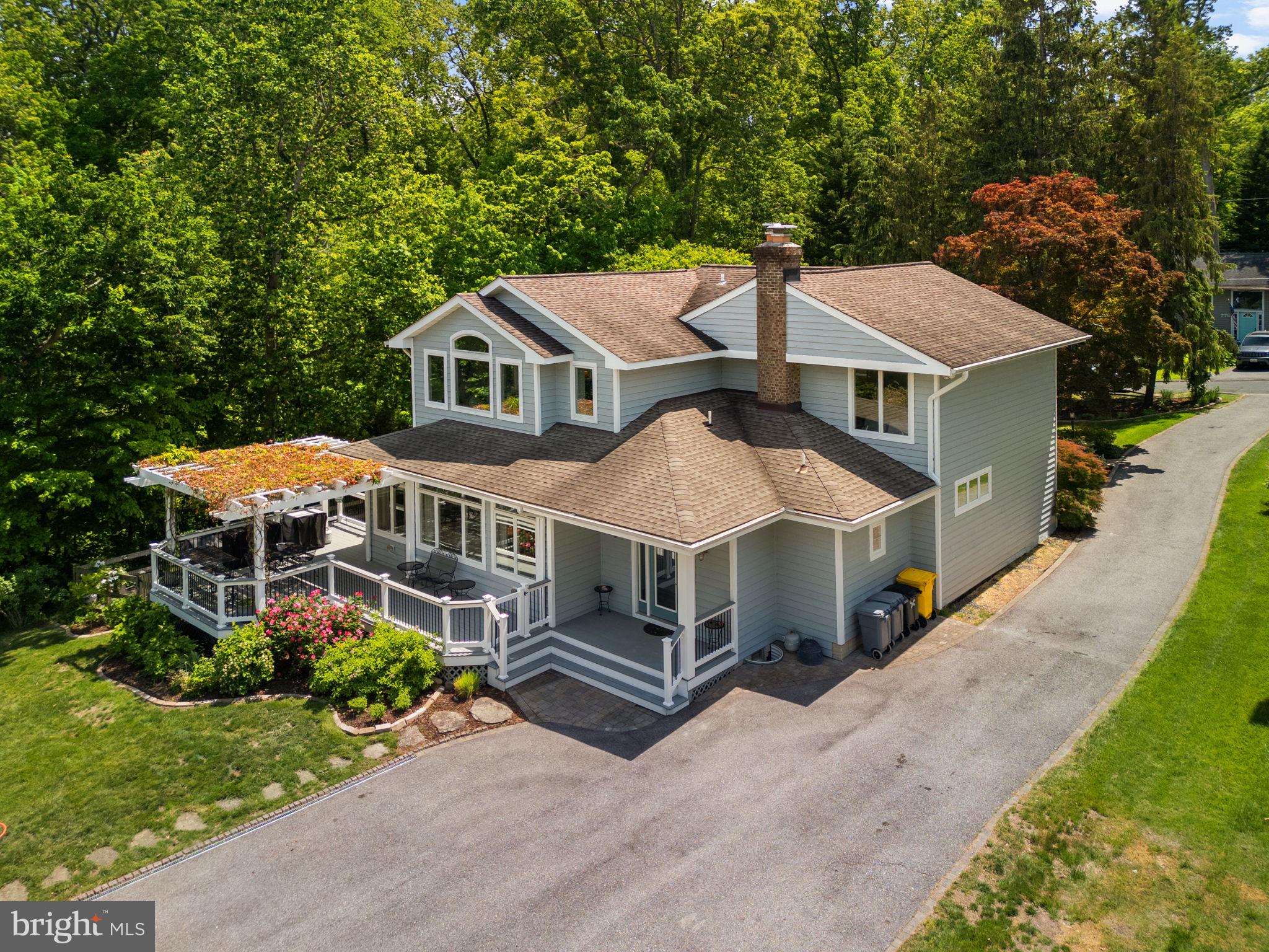 743 Rolling View Drive Annapolis, MD 21409 - Photo 65 of 100 an aerial view of a house with a yard and potted plants