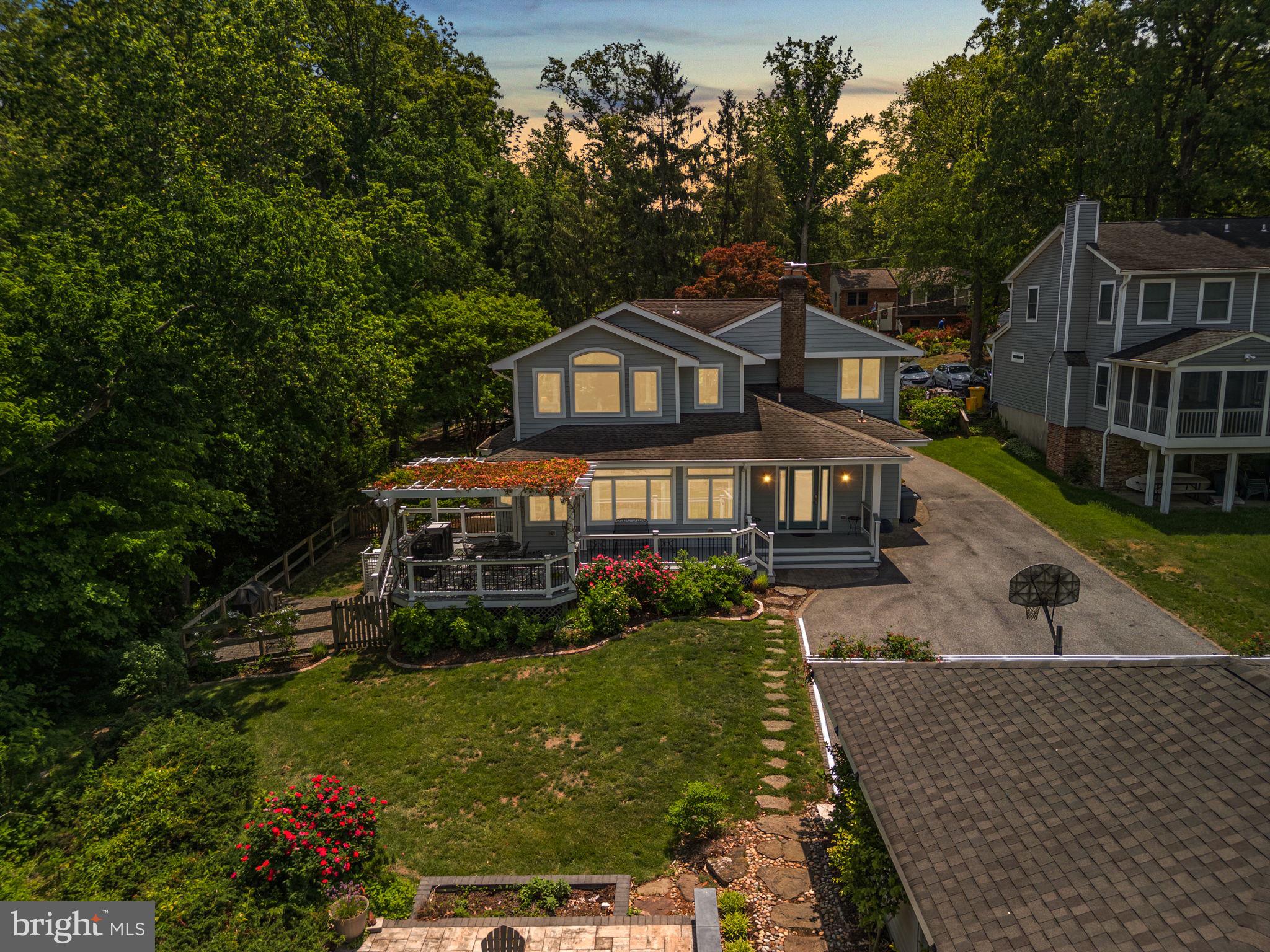 743 Rolling View Drive Annapolis, MD 21409 - Photo 66 of 100 a front view of a house with a garden