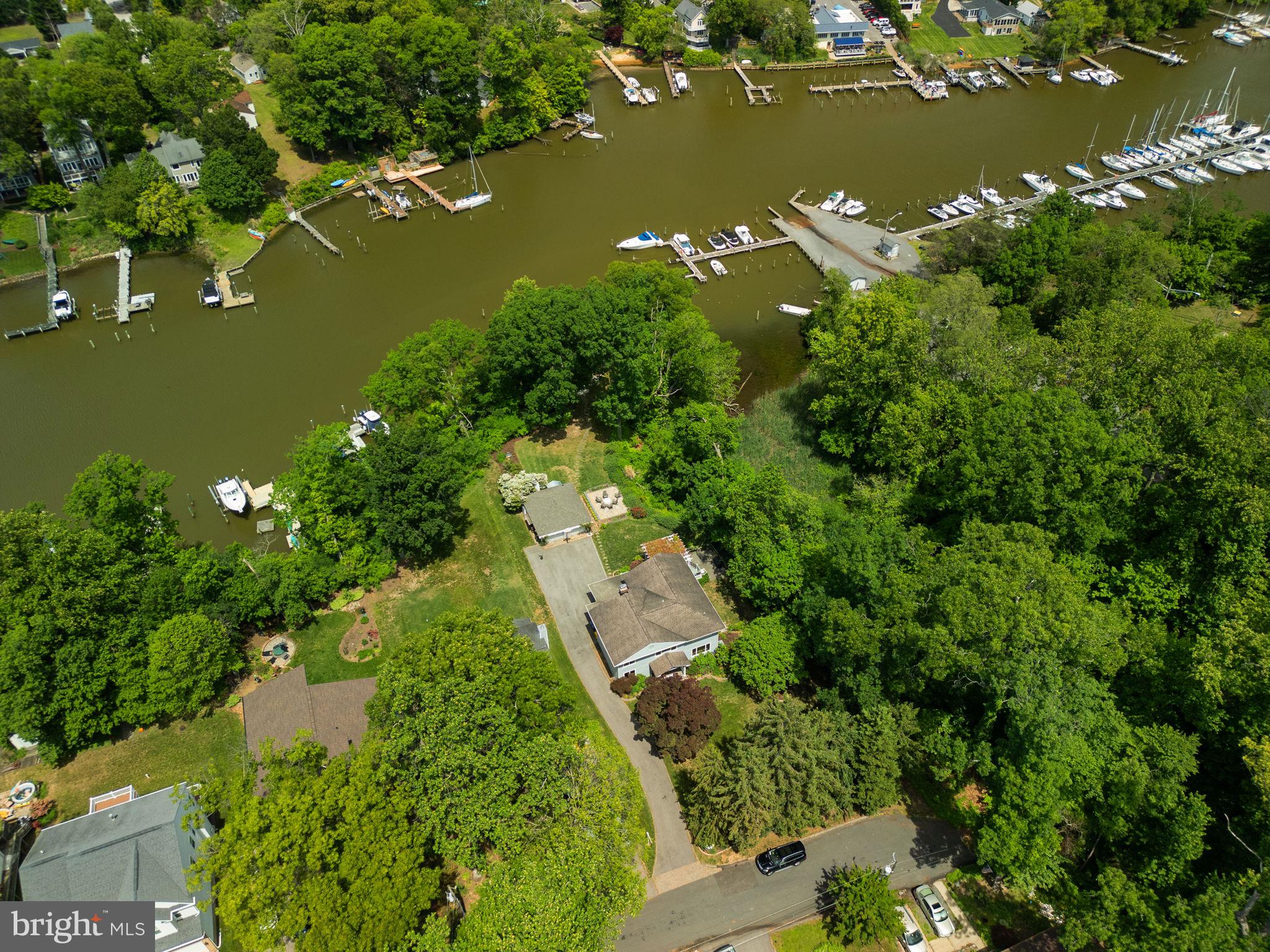 743 Rolling View Drive Annapolis, MD 21409 - Photo 78 of 100 an aerial view of water body with boats and trees all around