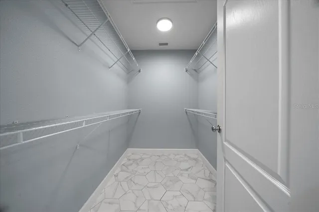 a view of a hallway with elevator