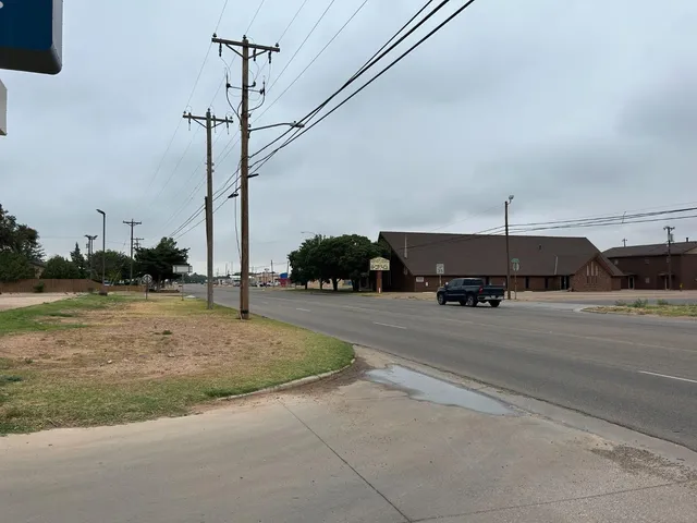 a view of a street with cars