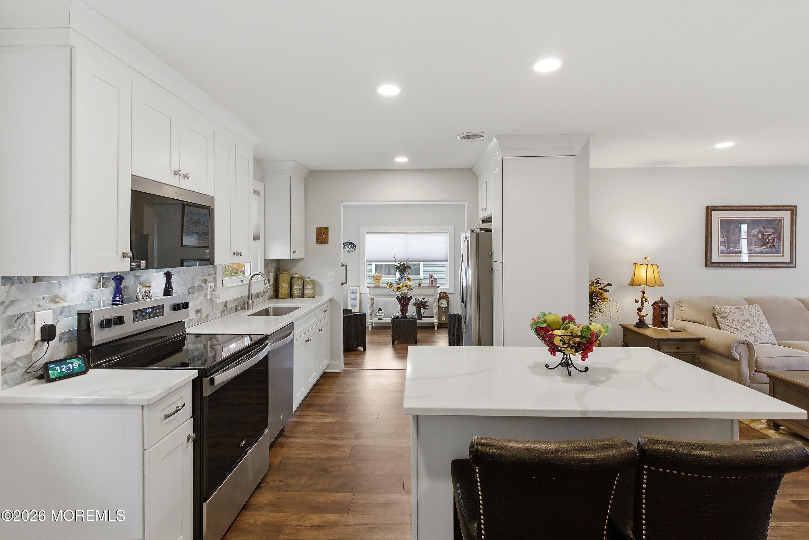 2 Berry Hill Road, Unit 72 Whiting, NJ 08759 - Photo 12 of 43 a kitchen with lots of counter top space and appliances
