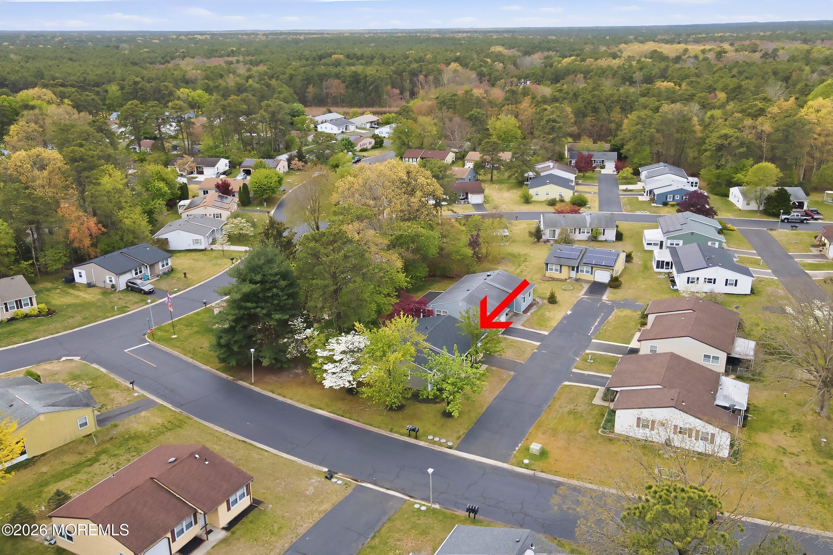 2 Berry Hill Road, Unit 72 Whiting, NJ 08759 - Photo 20 of 43 an aerial view of residential houses with outdoor space