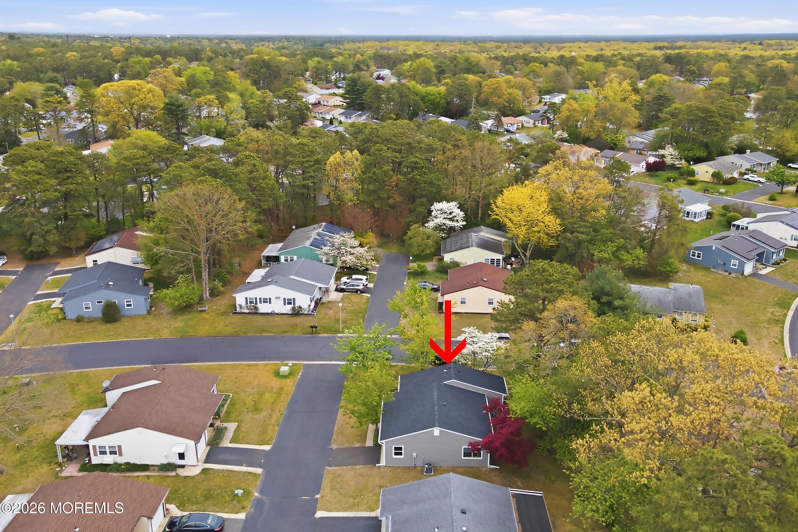 2 Berry Hill Road, Unit 72 Whiting, NJ 08759 - Photo 25 of 43 an aerial view of residential houses with outdoor space