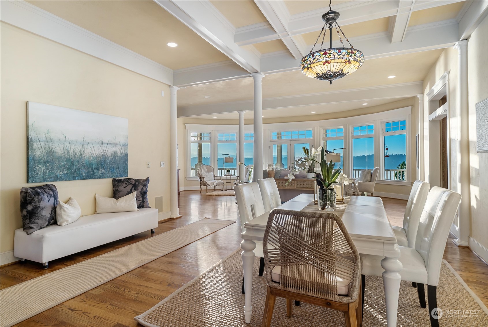 4141 Boston Harbor Road Northeast Olympia, WA 98506 - Photo 15 of 40 a view of a dining room with furniture wooden floor and chandelier