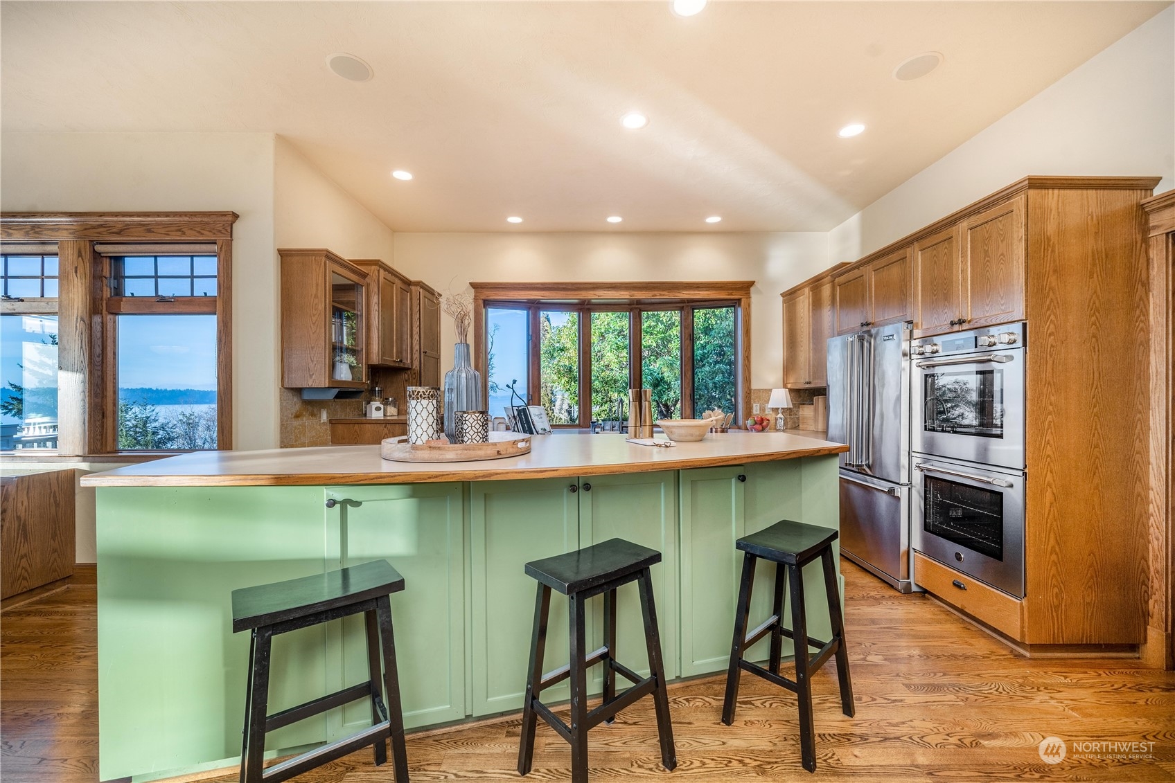 4141 Boston Harbor Road Northeast Olympia, WA 98506 - Photo 21 of 40 a kitchen with a table and chairs in it