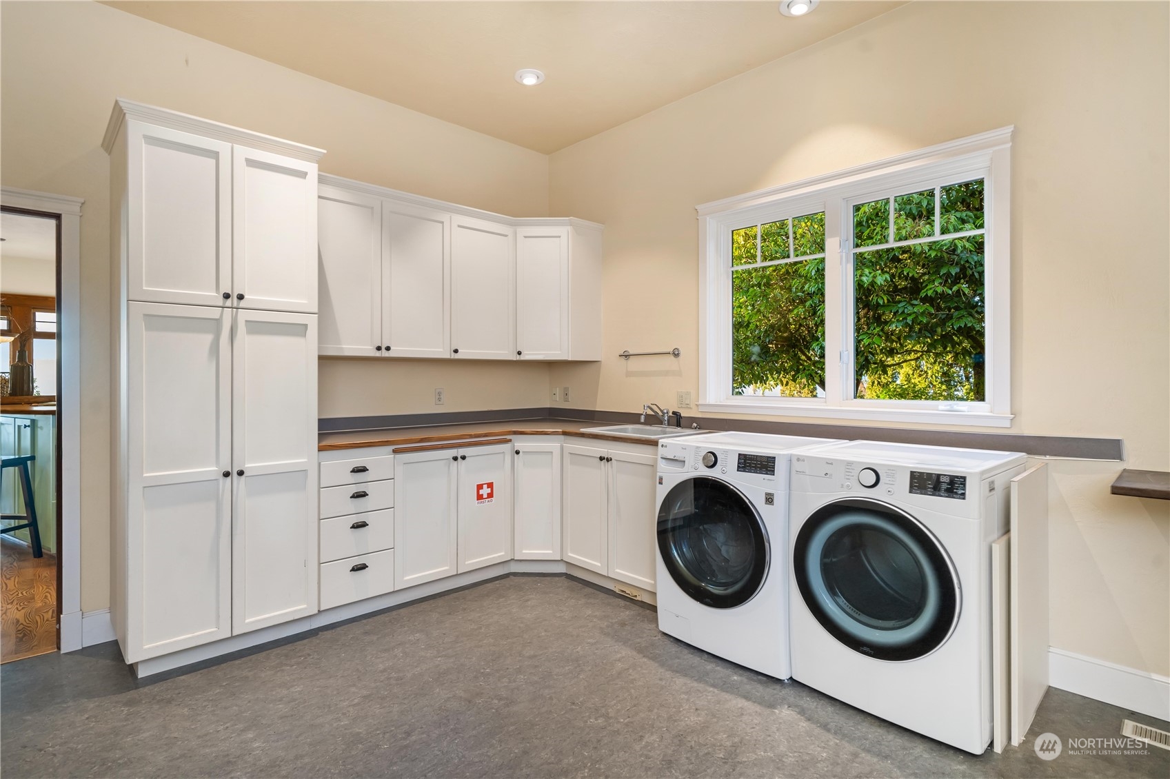 4141 Boston Harbor Road Northeast Olympia, WA 98506 - Photo 33 of 40 a utility room with sink dryer and washer