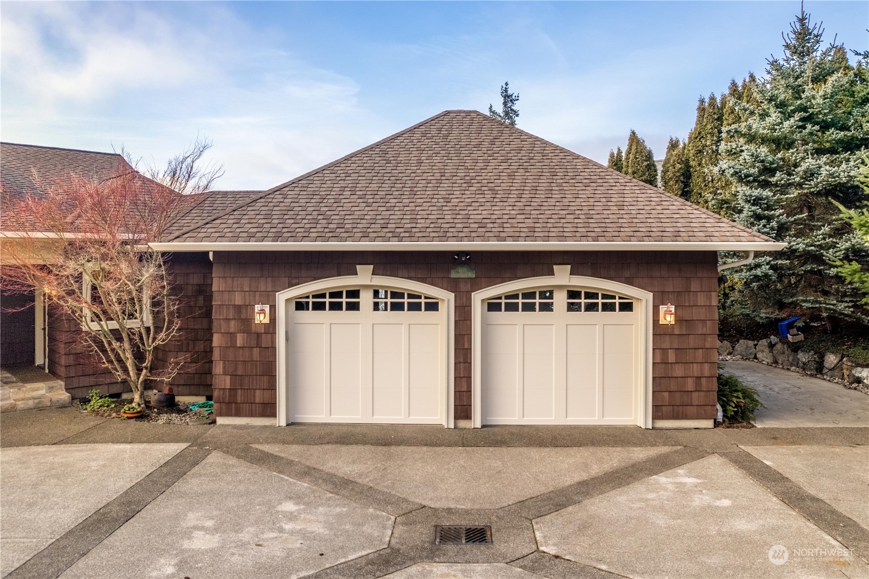 4141 Boston Harbor Road Northeast Olympia, WA 98506 - Photo 4 of 40 a front view of a house with a yard and garage