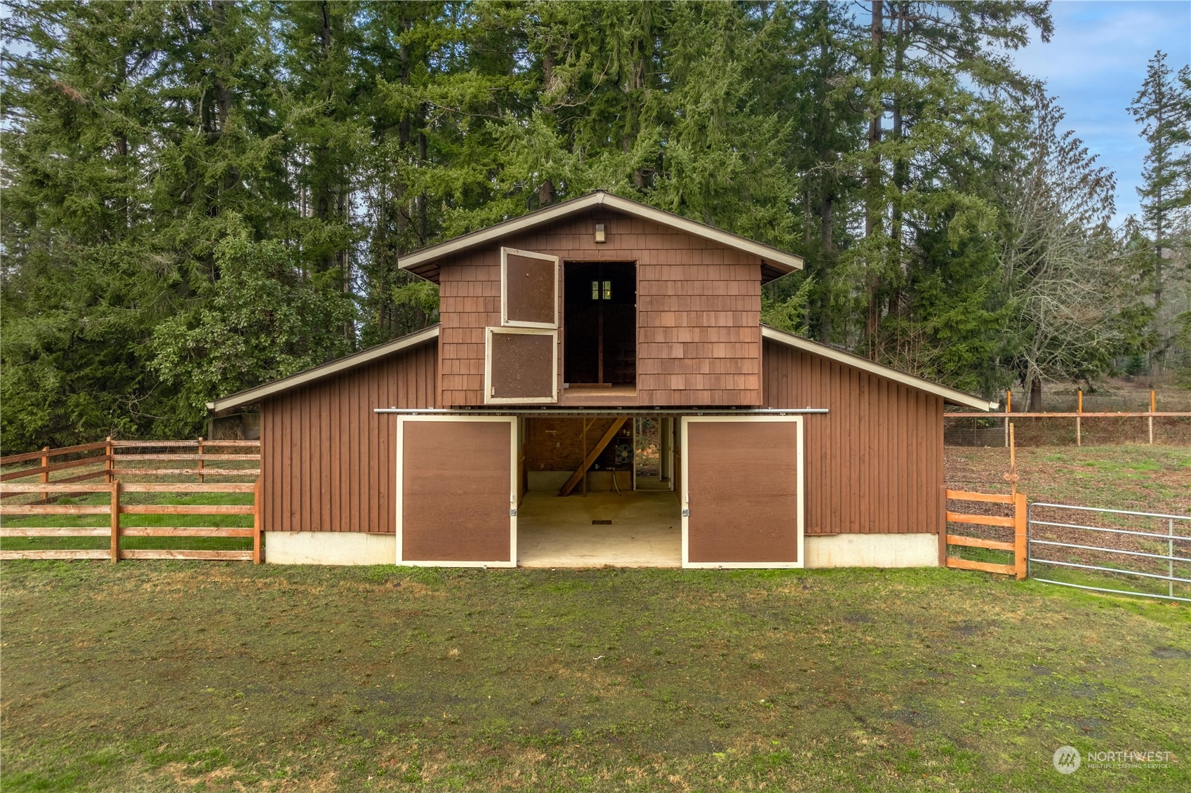 4141 Boston Harbor Road Northeast Olympia, WA 98506 - Photo 9 of 40 a backyard of a house with lots of green space