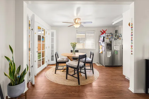 a kitchen with a sink stove top oven and cabinets