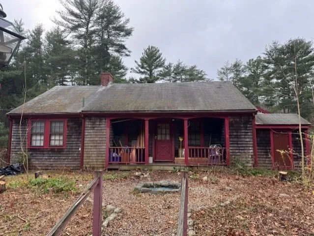 front view of a house with a yard