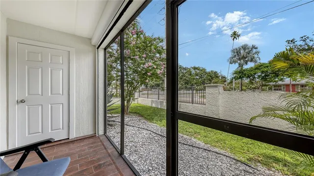 a view of a balcony with wooden floor