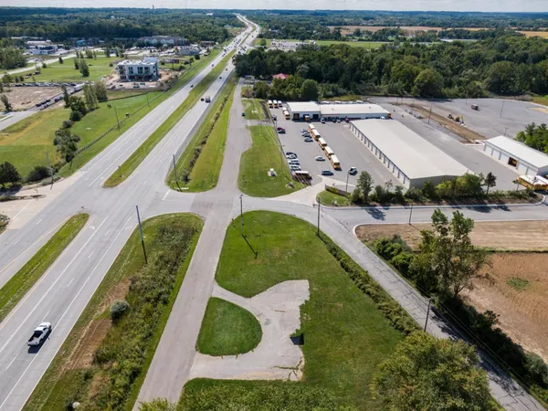 an aerial view of a house with a garden