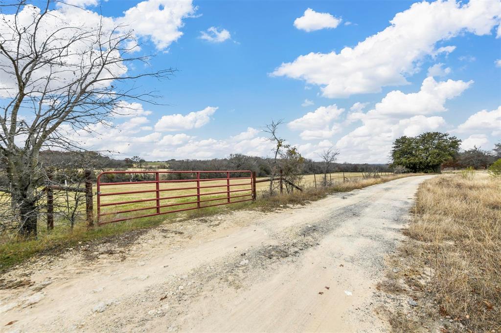 9999 South Fm 730 Azle, TX 76020 - Photo 5 of 24 a view of backyard with wooden fence