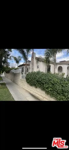 a view balcony of a house with a yard