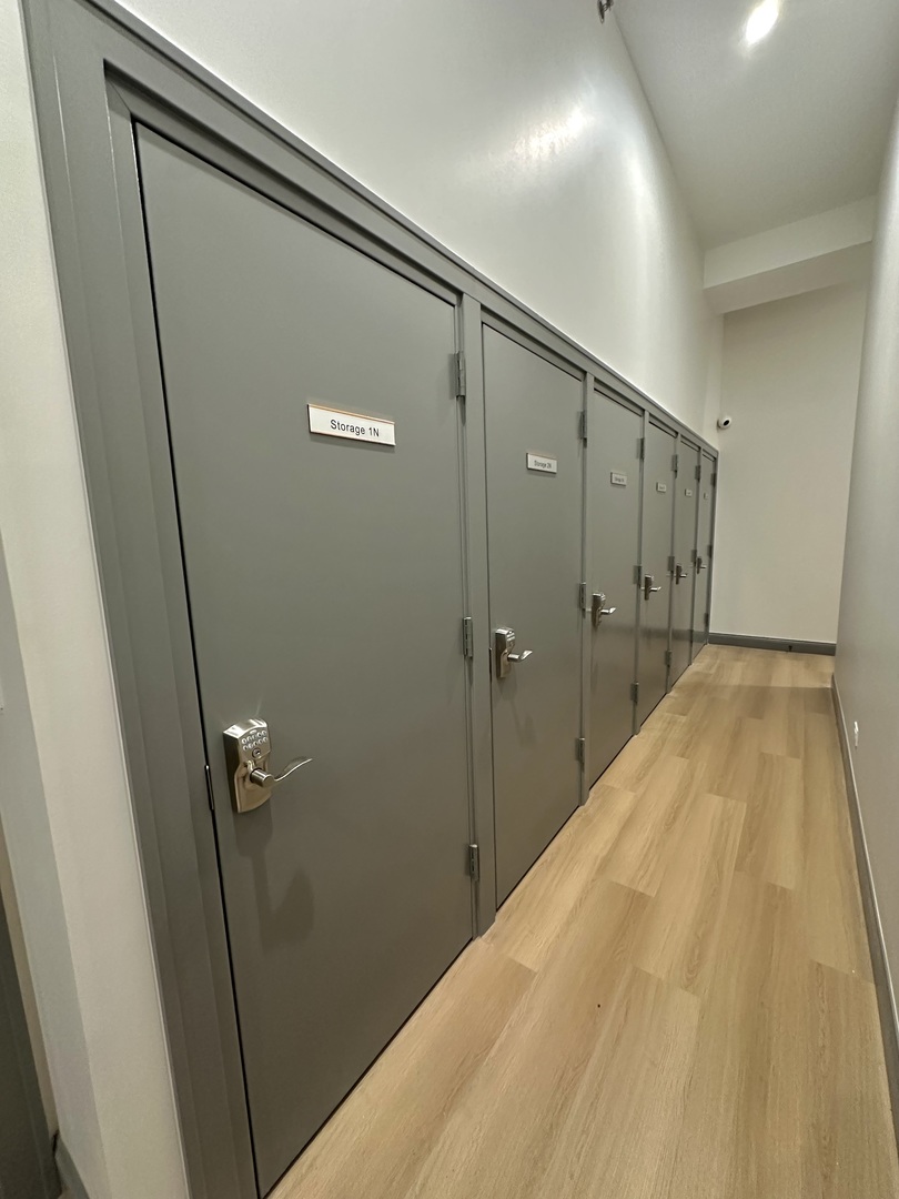 1615 West Irving Park Road, Unit 2N Chicago, IL 60613 - Photo 21 of 24 a bathroom with a shower and a tub