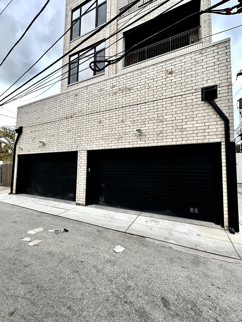 1615 West Irving Park Road, Unit 2N Chicago, IL 60613 - Photo 23 of 24 a bathroom with a sink and a shower