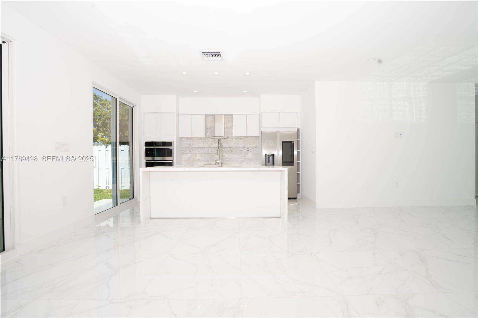 900 Southwest 24th Road Miami, FL 33129 - Photo 11 of 27 a view of kitchen with stainless steel appliances cabinets