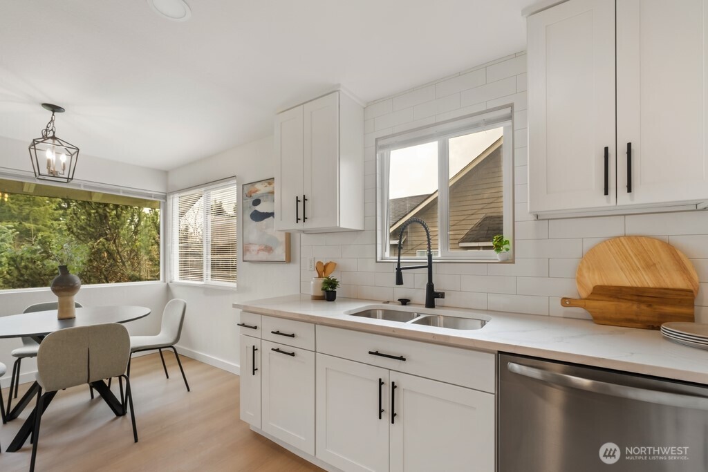 13121 Golden Given Road East Tacoma, WA 98445 - Photo 12 of 39 a kitchen with a sink and a window