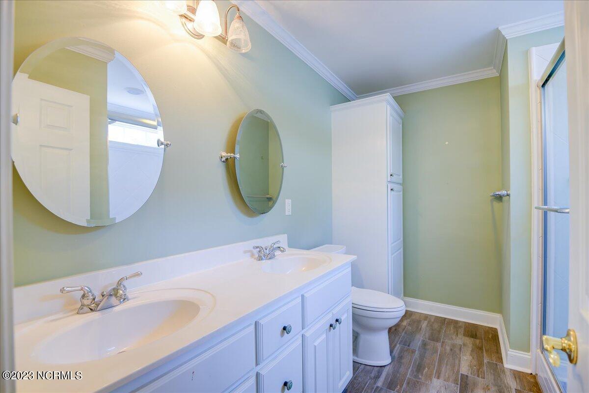 442 Neuchatel Road New Bern, NC 28562 - Photo 28 of 41 Primary Bathroom with dual vanities and new walk in shower