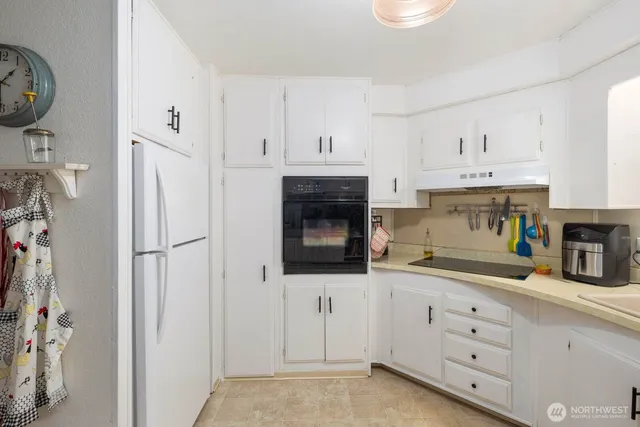 a very nice looking dining room with a table and chairs